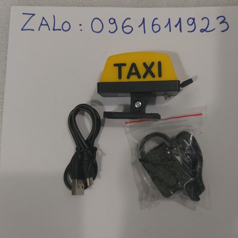 đèn taxj lắp xe máy và mũ bảo hiểm