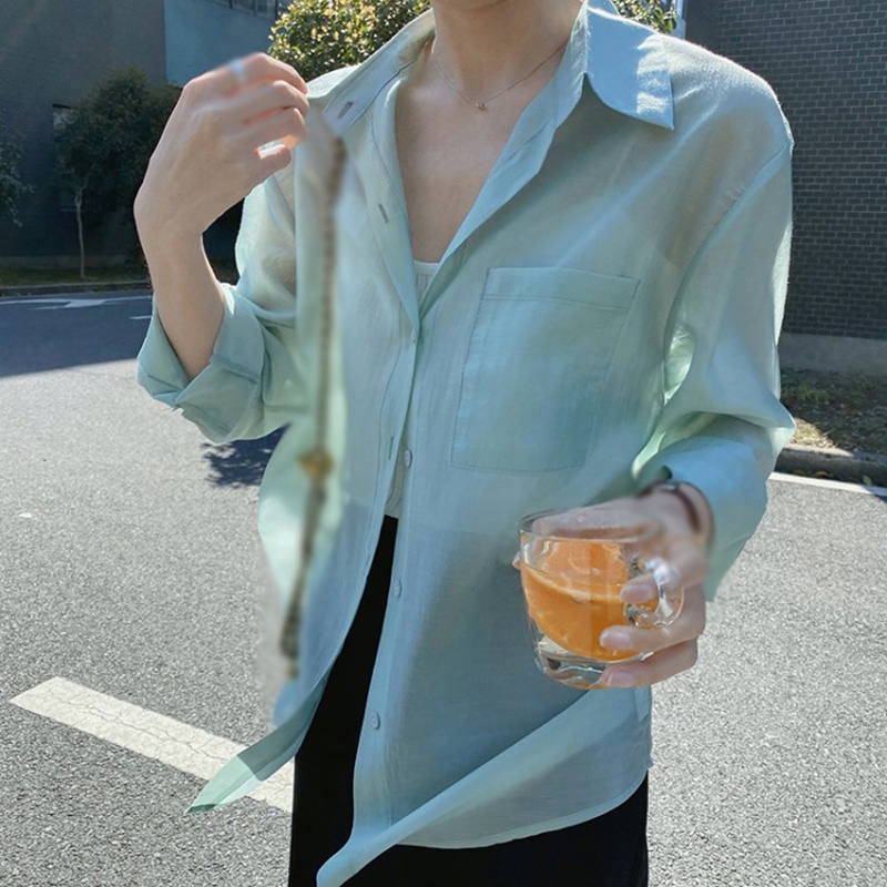 Áo sơ mi tay dài phối nút thiết kế oversized cho phái nữ