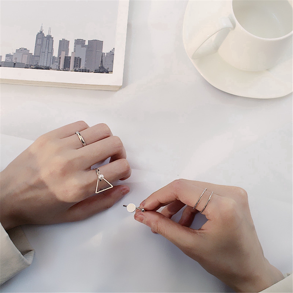 Bộ 4 nhẫn bằng hợp kim đính hạt ngọc trai thiết kế đơn giản thời trang thanh lịch cho nữ