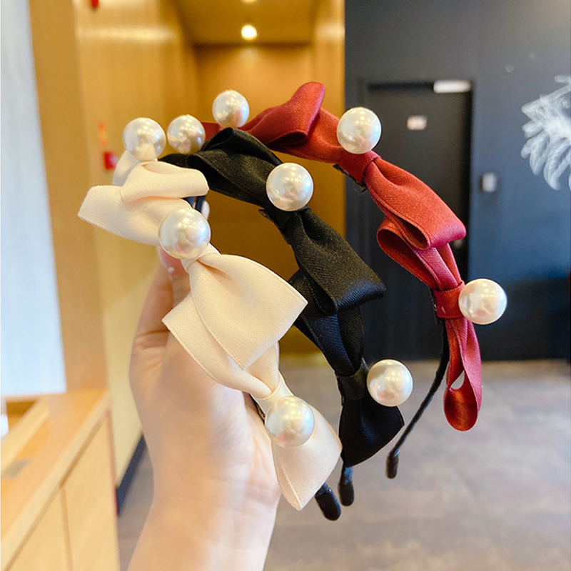 Băng đô cài tóc đính nơ và ngọc trai thời trang Hàn Quốc