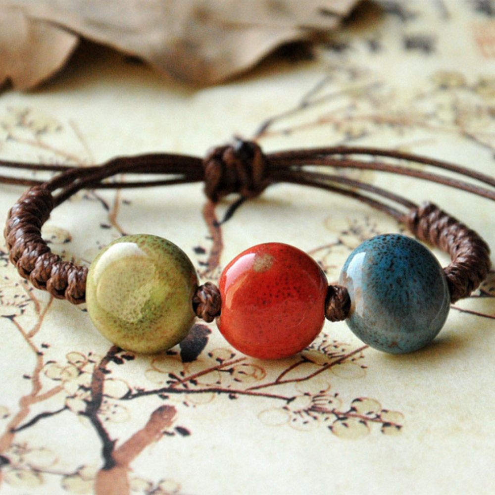 Vòng Đeo Tay Kết Hạt Sứ Hình Chiếc Lá Cho Nam Và Nữ