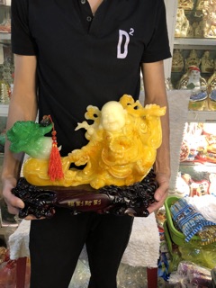 Phật di lạc kéo cải