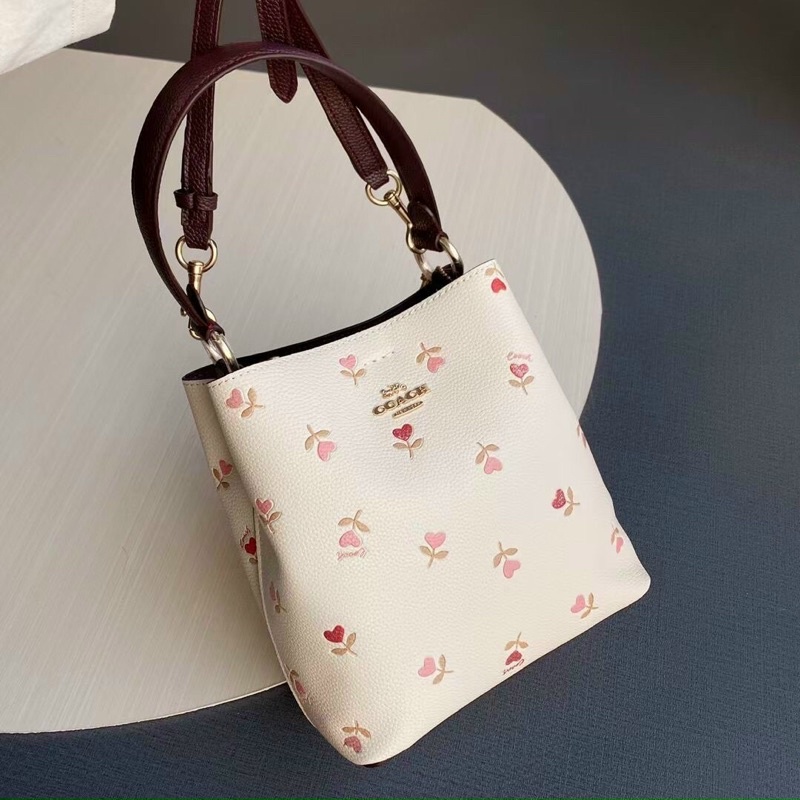 Túi Coach bucket hoa xinh size nhỏ