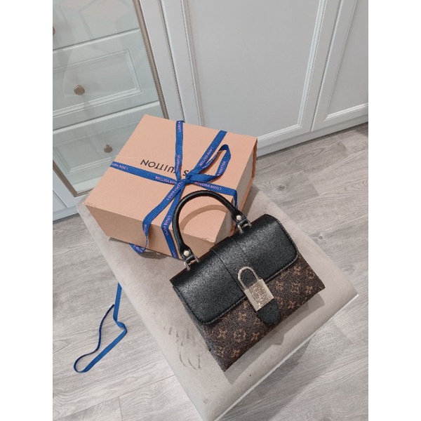 Túi Lou.is Vuitton Lock me