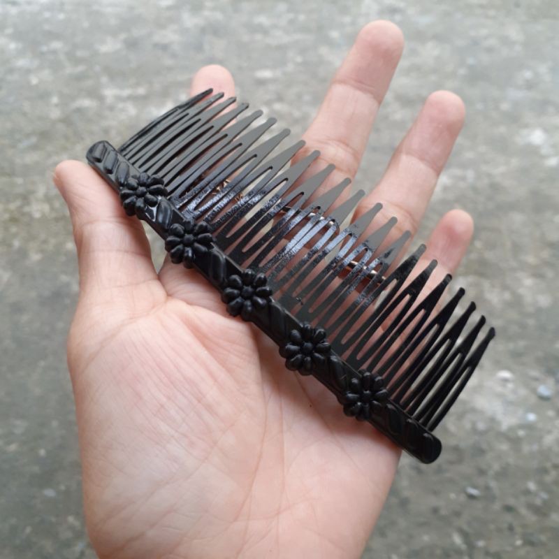 Lược cài nhựa mềm đính hoa lá màu đen