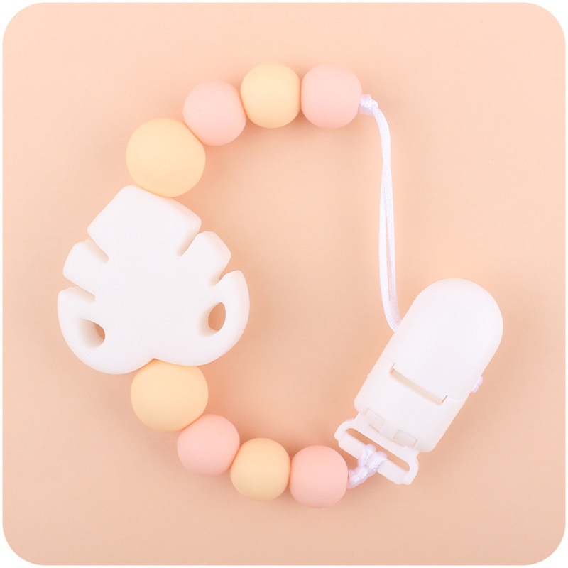 Kẹp Núm Vú Giả Bằng Silicon Hình Chiếc Lá Dễ Thương Cho Bé Sơ Sinh Mọc Răng