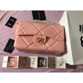 Túi prada hồng nude