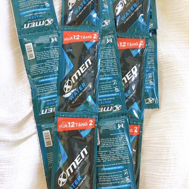 Dây 14 gói dầu gội x’men