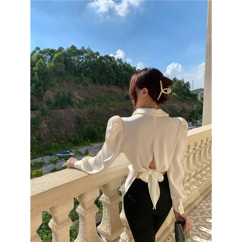 Áo sơ mi nữ tay dài phồng màu kem trắng cổ polo đính nút xẻ tà ulzzang thắt dây nơ sau lưng