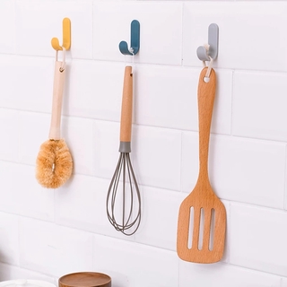 Convenient J-shaped towel rack