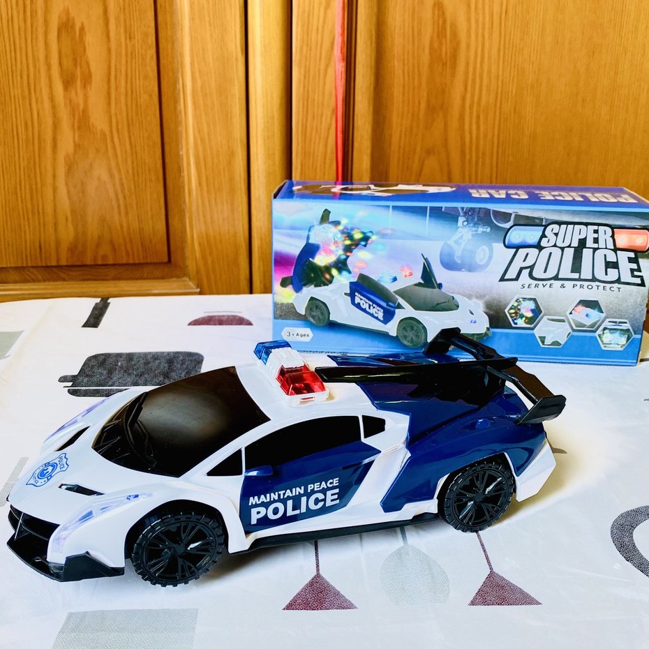 Xe Oto cảnh sát phát sáng quay tròn 360 độ