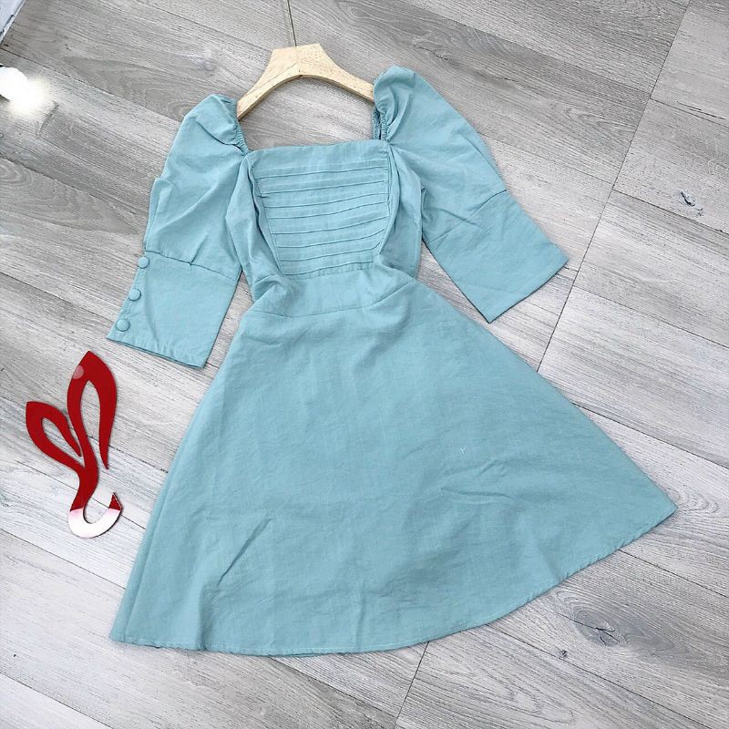 Đầm nút bọc tay phồng xép ly ngực mocking