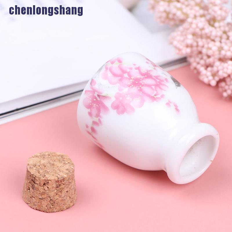 Chai bằng gốm sứ thủy tinh để đựng chất lỏng có nút bần bằng gỗ tiện dụng