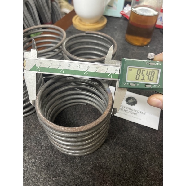 Lò Xo Nén phi ngoài 85 sợi 5 cao 69-70mm