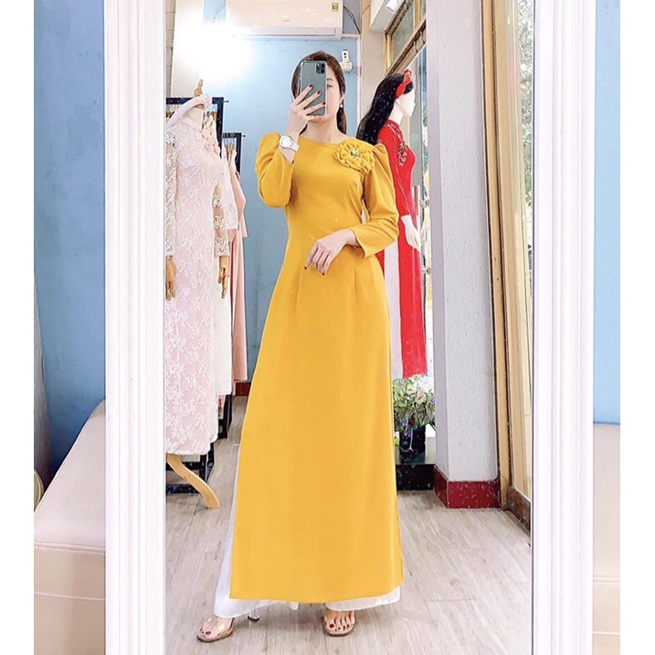 Áo dài vàng cổ đính bông xinh, cổ tròn tay lỡ chất vải lụa tây thi 2 tà mềm mại