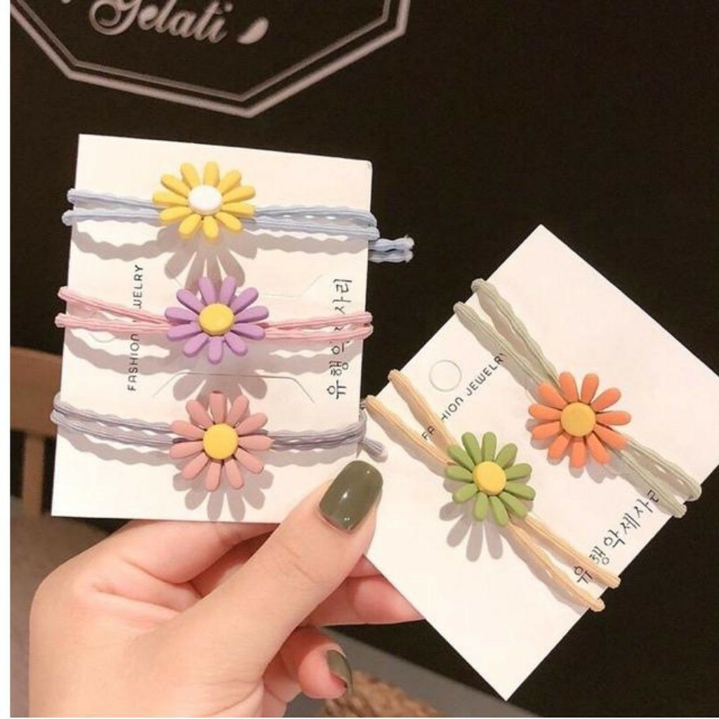 Buộc tóc hoa cúc sắc màu đáng yêu