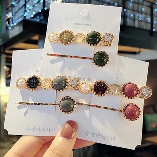 Set 2 kẹp tóc đính đá dạng hạt tròn