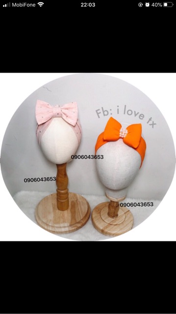 Đầu manocanh bọc vải đội nơ