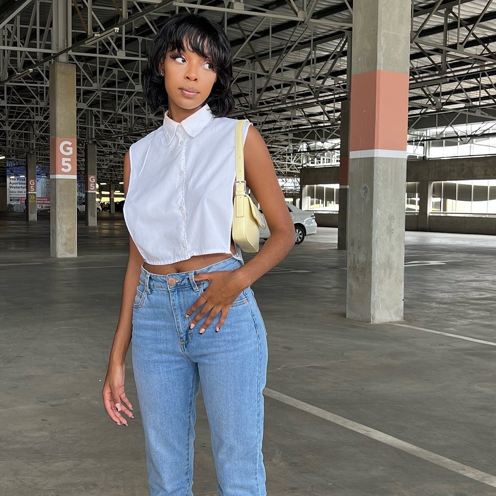 Áo Tank Top Dáng Rộng Màu Trơn Phối Nút Cá Tính Cho Nữ