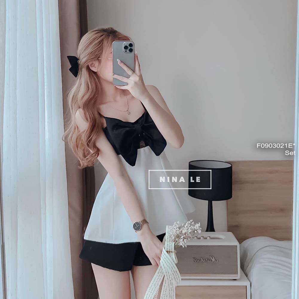 Set tăcta phối màu đen trắng áo tùng xòe nơ ngực 2 dây kèm quần short!
