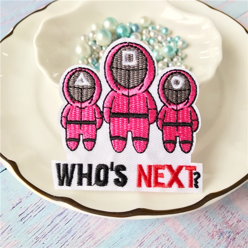 1 miếng dán ủi quần áo hình nhân vật game Who's Next?