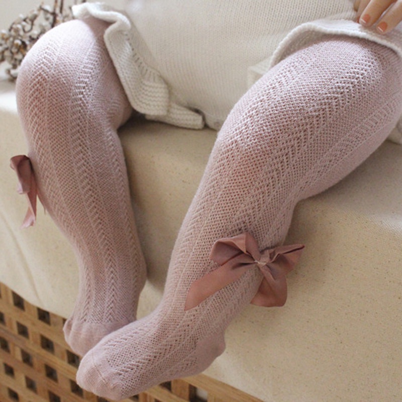 Quần vớ bó cotton lưới mềm mại thoáng khí đính nơ màu trơn thời trang dành cho bé gái
