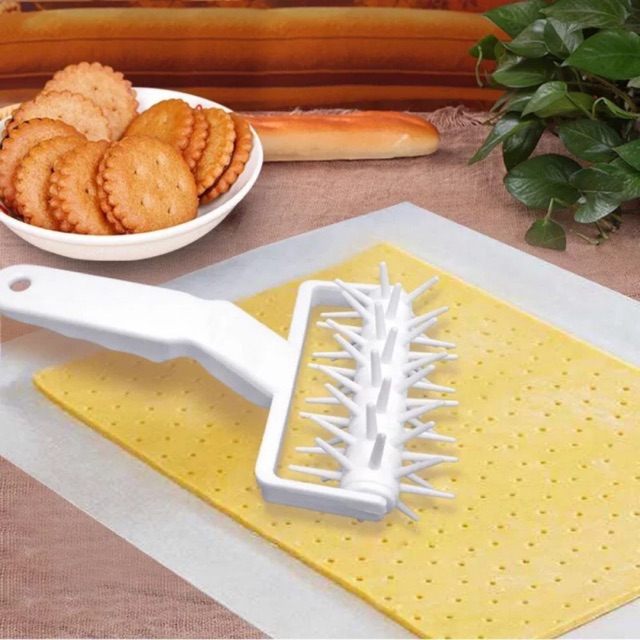 Dụng cụ xăm lỗ pizza
