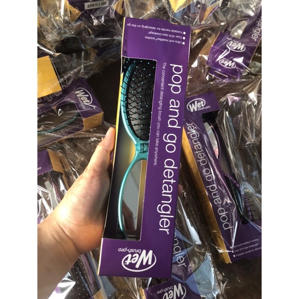 Lược WetBrush gập nhỏ kèm kính soi mặt