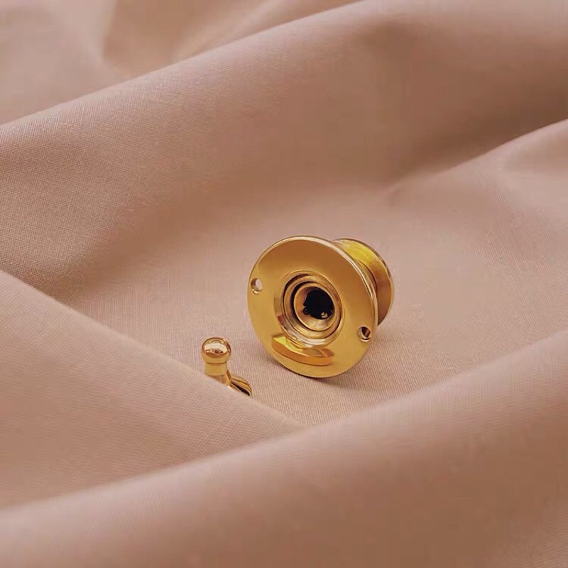 Nút khoá nấm túi xách UFO