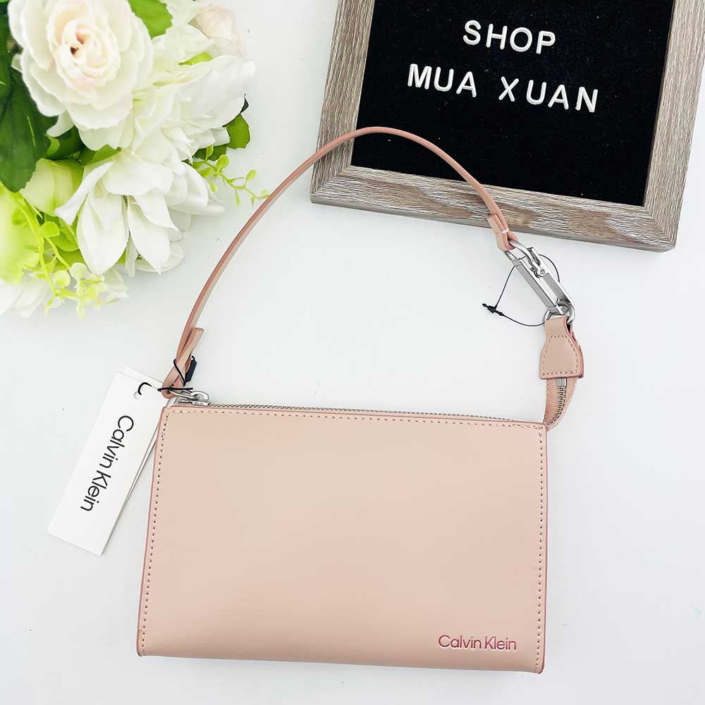 Túi đeo vai nữ Calvin Klein Embossed Logo Convertible Pouch, Pink