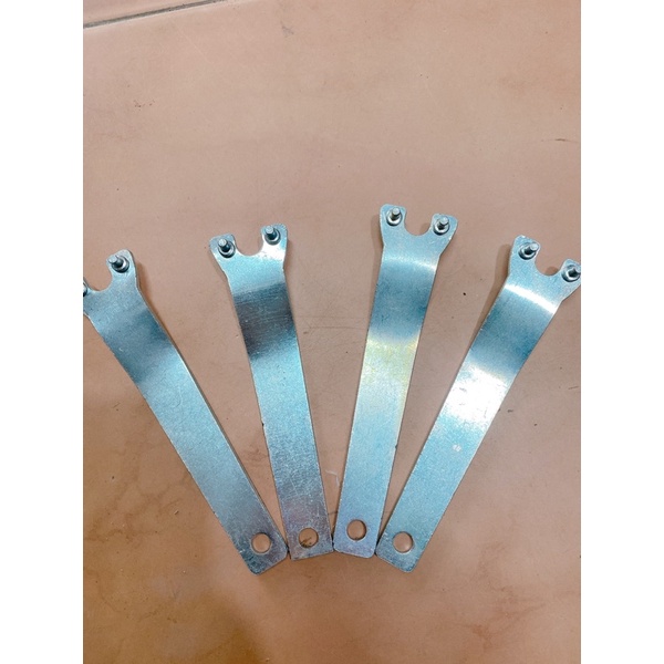Dụng cụ mở máy mài