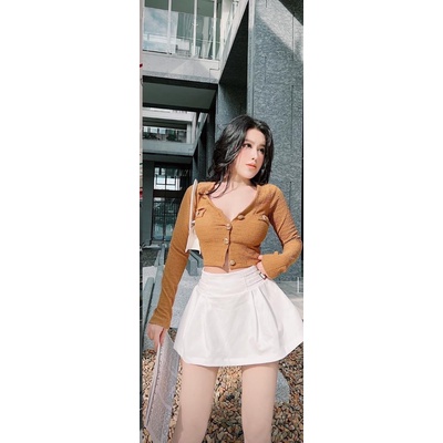 ÁO thun xốp nữ đính nút kiễu tay dài phối túi giã hot 74