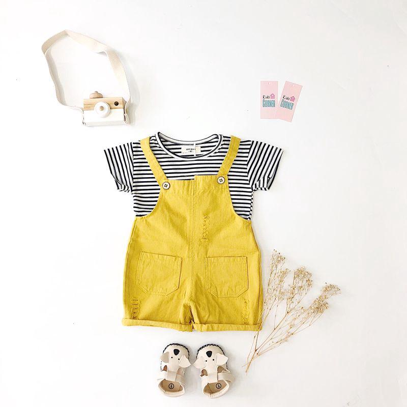 Set áo đen quần yếm vàng