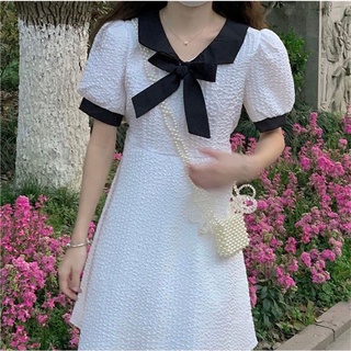 ĐẦM TRẮNG GẤM XỐP PHỐI CỔ ĐEN NƠ TIỂU THƯ