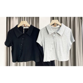 Áo polo cúc lệch