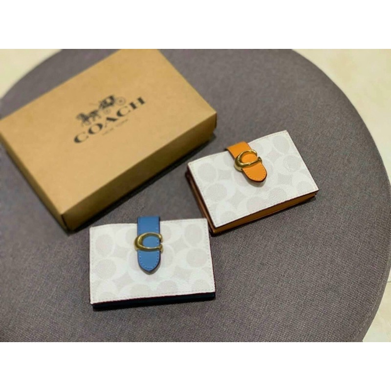 SALE - Ví mini C.@.a.chi khoá chữ C màu cam-hơi loang nhẹ