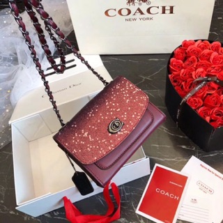 Túi đeo chéo Coach