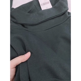 Áo thun cổ lọ xuất dư