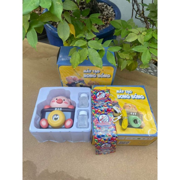 MÁY ẢNH BẮN BONG BÓNG CHÚ HEO ( quà km enpha)..