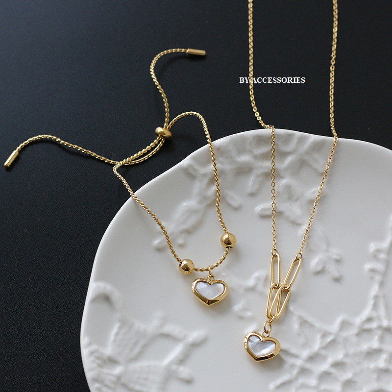 Dây chuyền titan trái tim bầu khảm xà cừ không gỉ