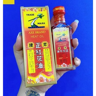 1 Dầu gió hiệu cây búa nước đỏ của malaysia