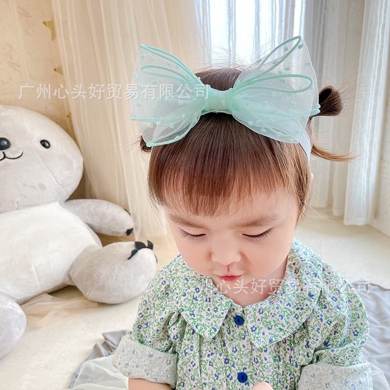 Băng đô nơ chấm đáng yêu cho bé