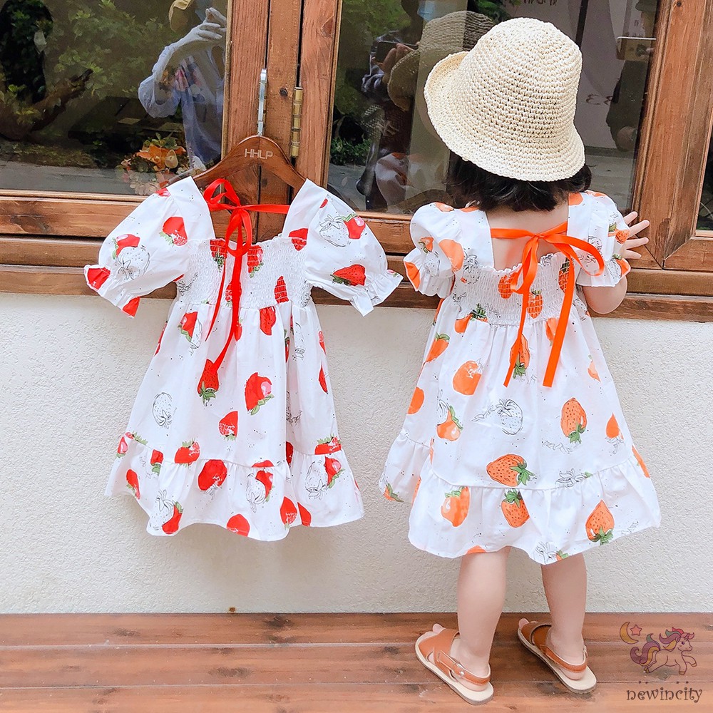 Đầm xòe tay phồng in hình quả dâu dễ thương dành cho bé gái