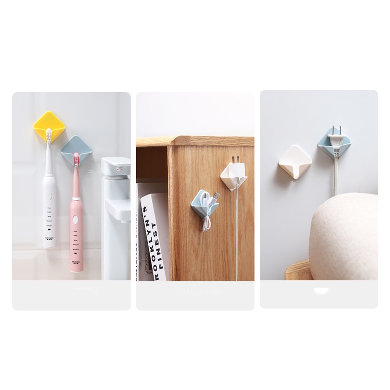 Móc treo phích cắm điện dán tường sáng tạo