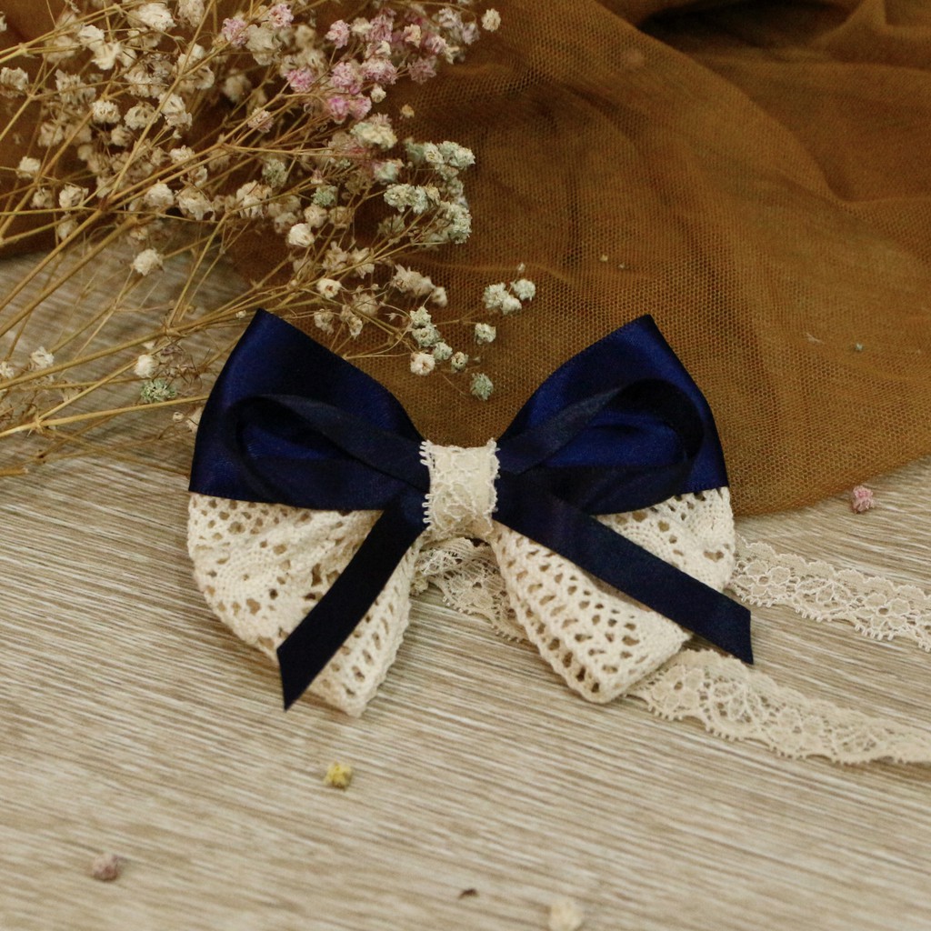 Băng đô nơ ren phối sang chảnh cho bé.