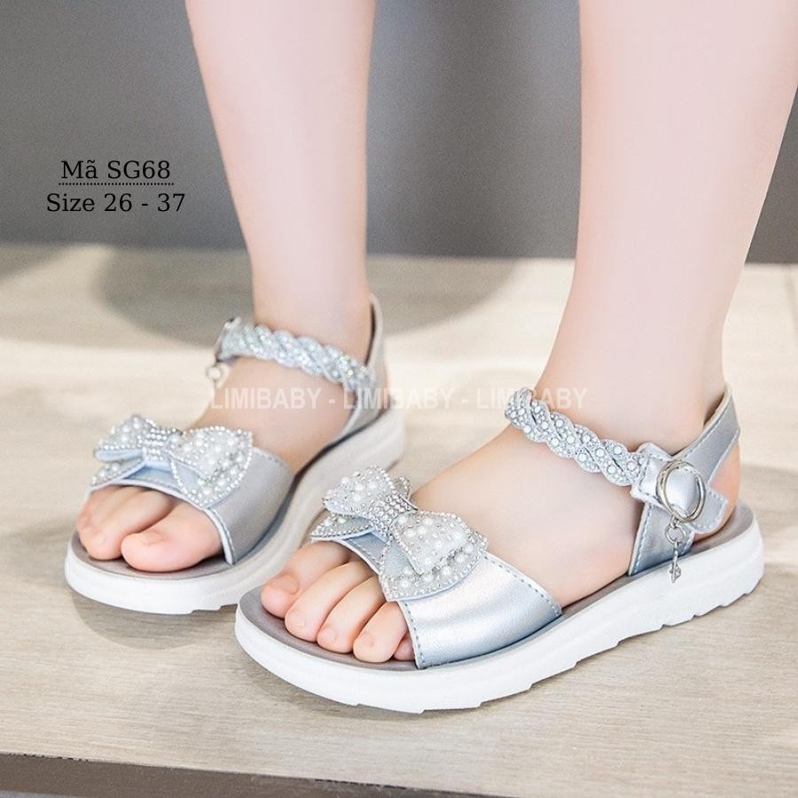 Sandal bé gái 3 - 12 tuổi gắn nơ công chúa điệu đà và duyên dáng màu bạc thời trang phong cách Hàn Quốc SG68