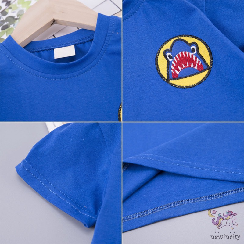 Bộ trang phục 2 mảnh gồm áo tay ngắn họa tiết cá mập và quần short thời trang Hàn Quốc cho bé trai