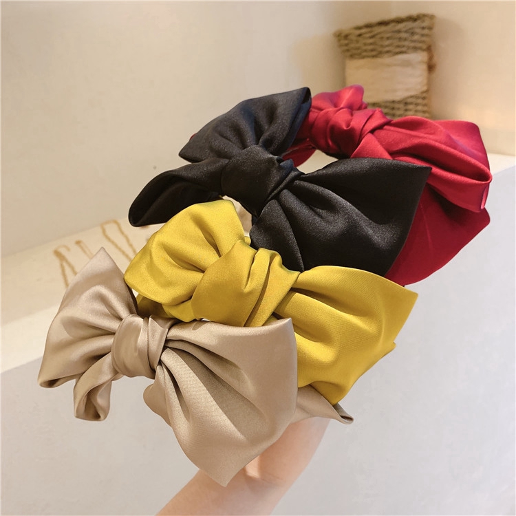 Cài tóc nơ đơn giản màu đen