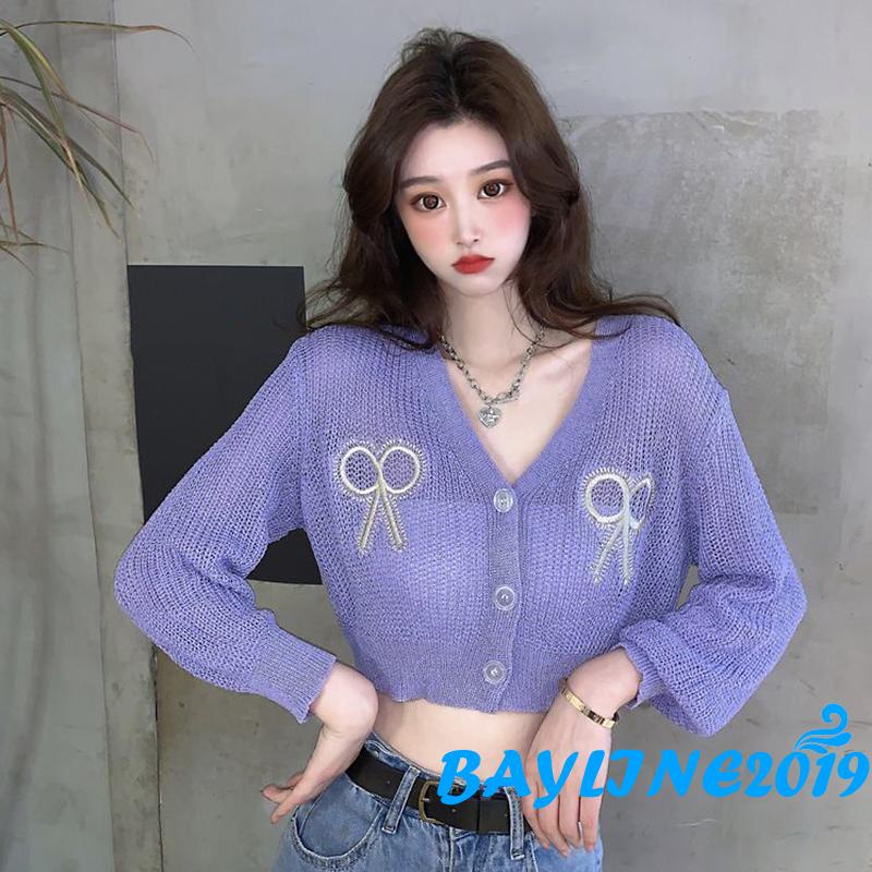 Áo croptop dệt kim tay dài cổ chữ V thêu họa tiết thắt nơ thời trang cho nữ