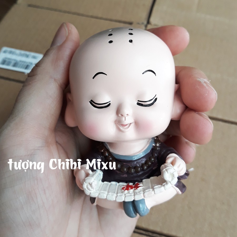 Tượng chibi chú tiểu học thư pháp